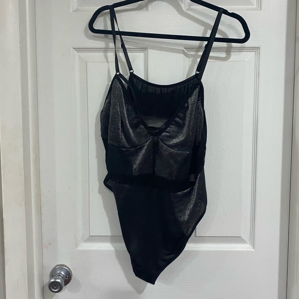 Black and grey body suit